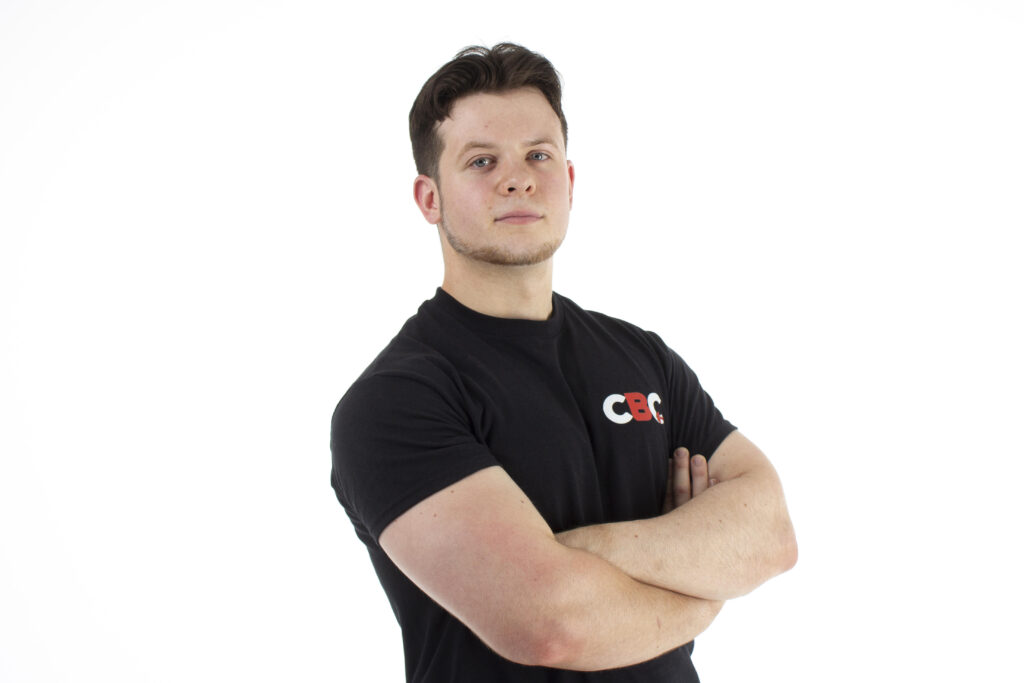 A man in a black t-shirt with CBC logo